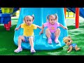 Alice And Baby Doll Play On The Outdoor Playground