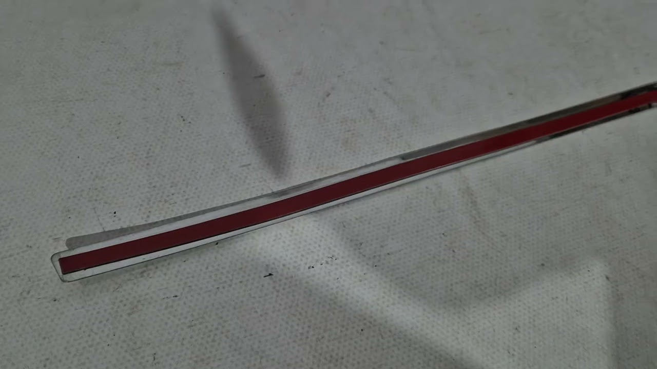 Накладка из нержавеющей стали над номером Carmos Video 1