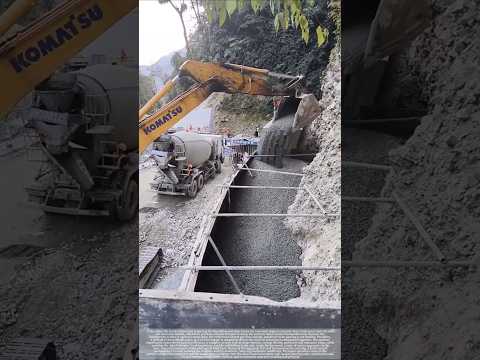 Excavators act as transporters, ensuring precise concrete pouring!
