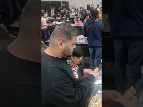 Fake Charizard? Ripped it in half to see if it was real. #charizard #pikachu #pokemoncards #pokemon