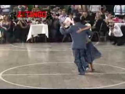  Fabian Peralta  and  Virginia Pandolfi  are  dancing  to  the  milonga  "  Milonga Sentimental  "