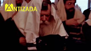 הרבי מליובאוויטש מנגן ניגון עסן עסט זיך (קט) - התמונה מוצגת ישירות מתוך אתר האינטרנט יוטיוב. זכויות היוצרים בתמונה שייכות ליוצרה. קישור קרדיט למקור התוכן נמצא בתוך דף הסרטון