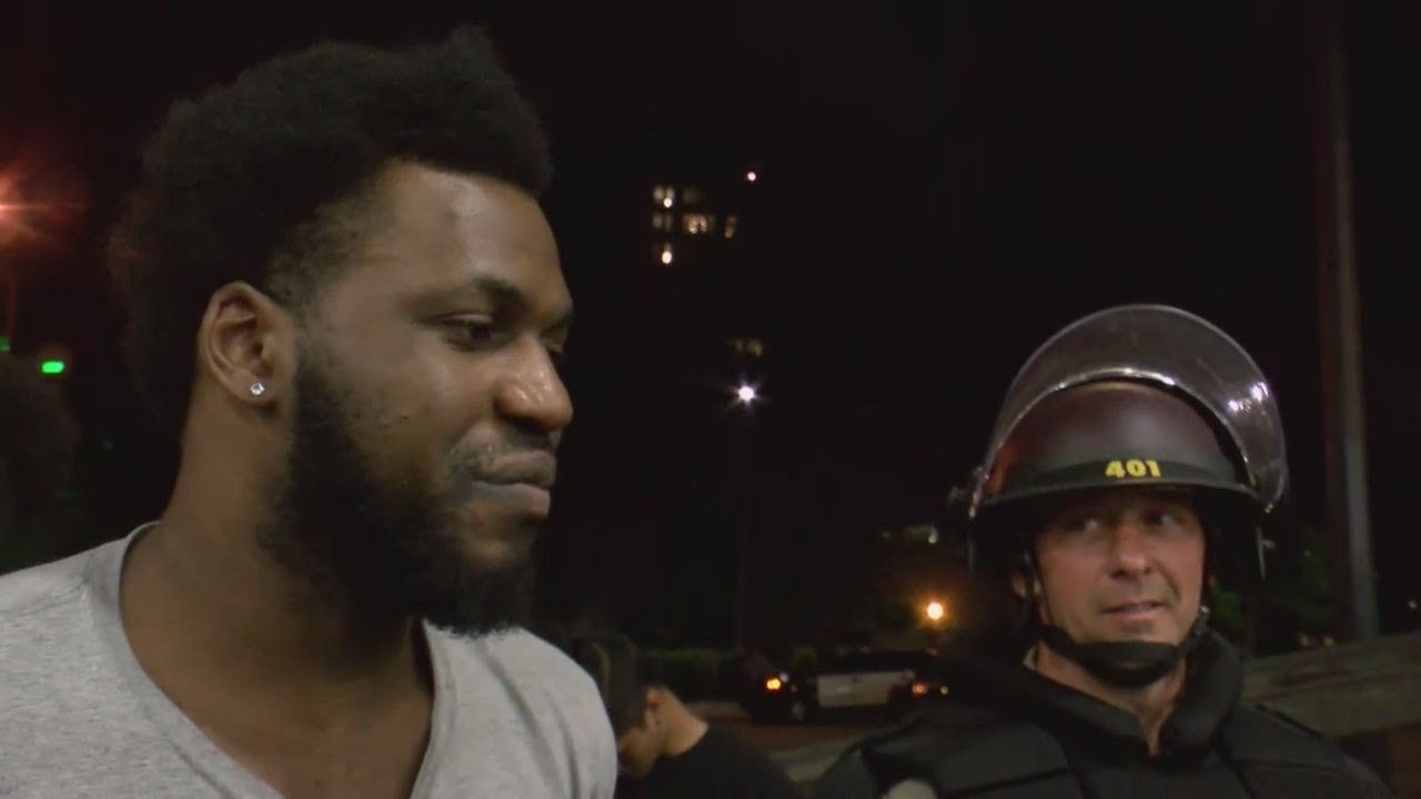 Minneapolis Protesters Bond With Arresting Officers