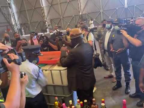 [Must Watch]  Minister of Police Bheki Cele Spilling Out Confiscated Alcohol  In Cape Town