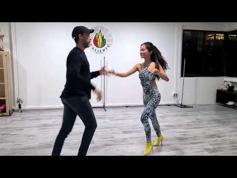 Caliente Dance Studio Singapore Salsa demo by Ali and Janey to Andy Montanez - El Swing