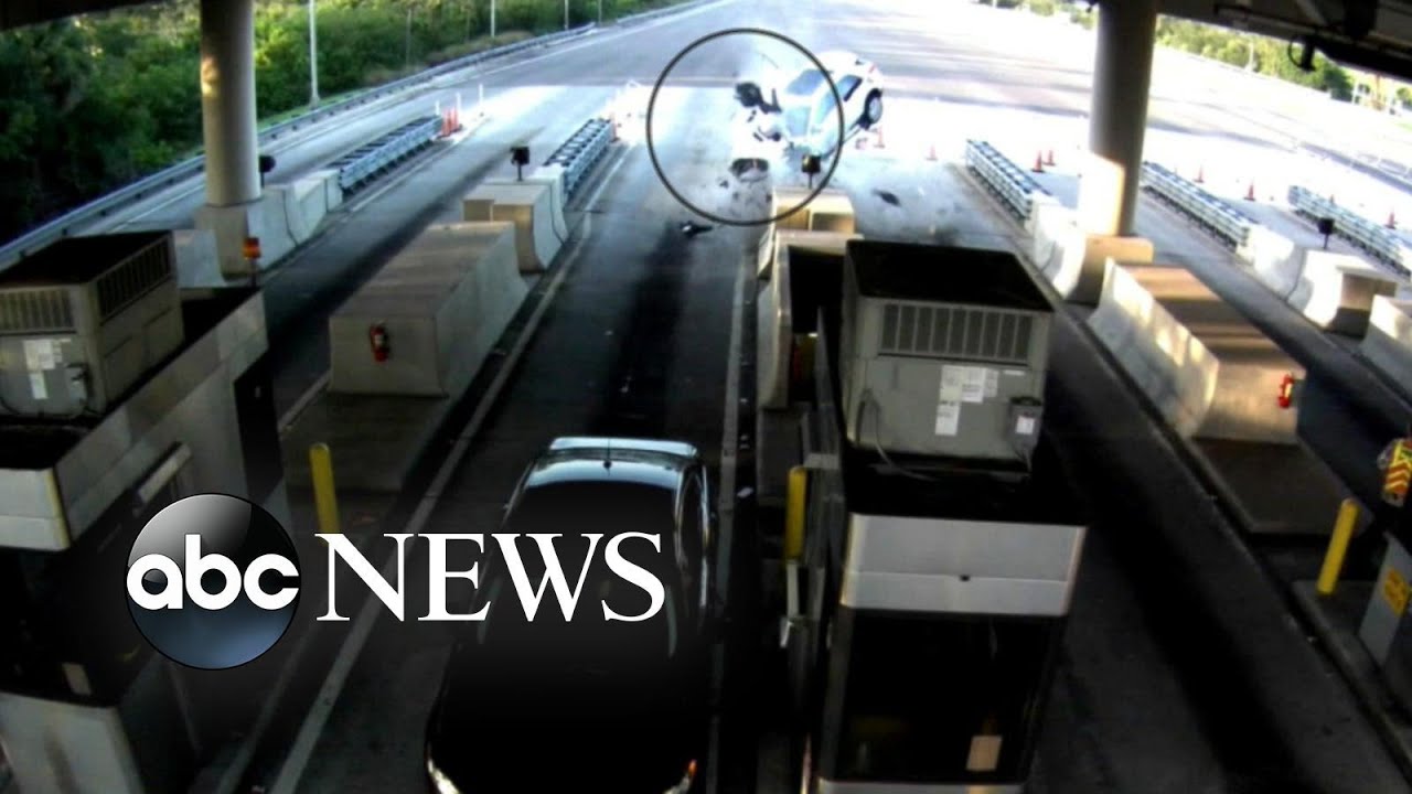 Passenger ejected from car after crash into toll plaza
