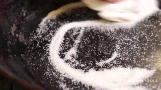 How do you clean a carbon steel pan with salt?