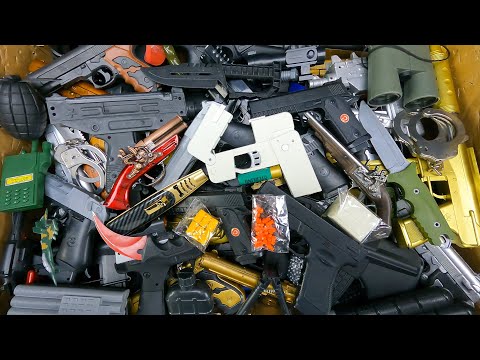 Looks Like a Phone... BUT DEFINITELY NOT A PHONE!!! Cell Phone Gun And Box Of Toy Guns, Lighter Gun