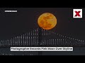 Photographer records rare Pink Moon over San Francisco city skyline | NewsX - Video
