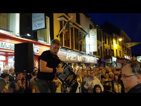 Irish Musician Liam O Connor plays the accordion for flash mob in killarney kerry
