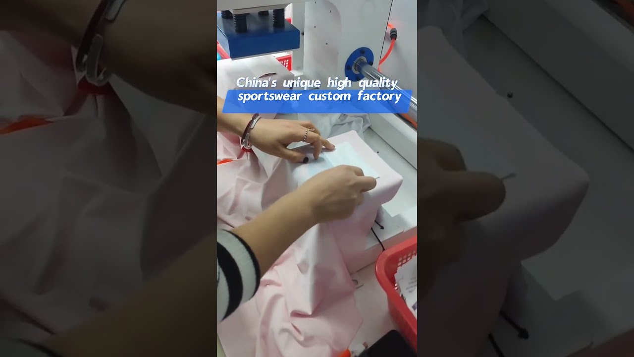Heat press label application at the factory of Tonton Sportswear