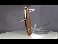 Šveicarija Victorinox Ranger 55 Wood kišeninis peilis su riešutmedžio kriaunomis