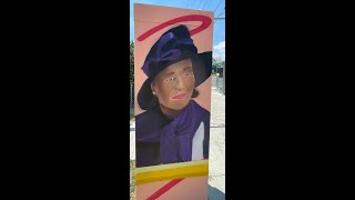 Portrait of Michelle Jean Outside the Box Mural