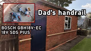 Dad's garden handrail, Bosch GBH18V-EC 18V SDS Plus Brushless Hammer Drill drilling into red brick