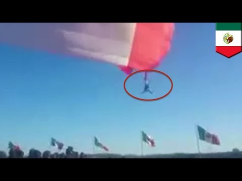 Freak accident: Flag launches soldier into the air, he falls 50 feet and survives - TomoNews