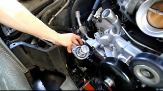 2000-2006 GMC Yukon waterpump with thermostat remove and install