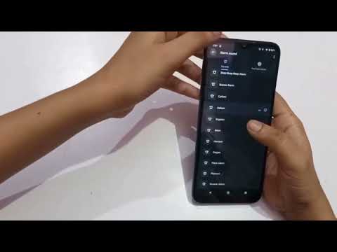how to Set alarm in Moto e6S alarm set kaise Karen