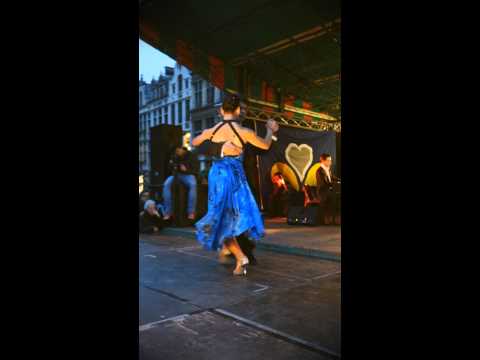  Alejandra Hobert  and  Adrian Veredice  are  dancing  to  a  tango  by  Solo Tango Orquesta  at  Brussels Tango Festival  in  2014