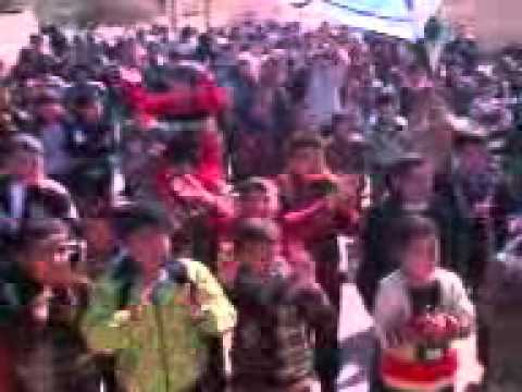 مظاهرة في قرية المغير في ريف حماة في جمعة "تسليح الجيش الحر"