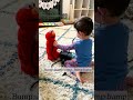 Toddler Playing Doctor With Elmo Shorts