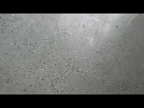 Cleaning the garage floors with a Lindhaus