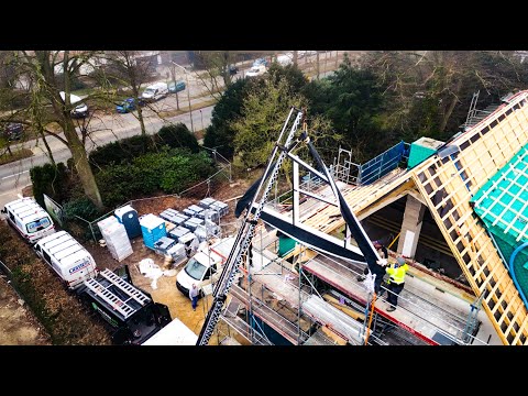 RAICO Holz-Alu Pfostenriegelfassade in 13 m Brüstungshöhe