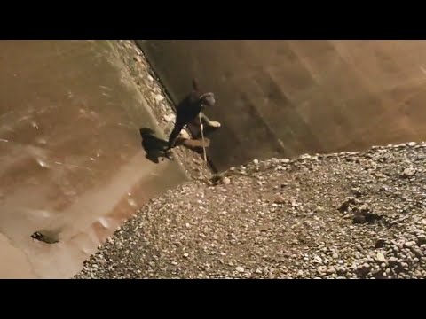 Barge unloading cobblestone!  Working at night is really not easy