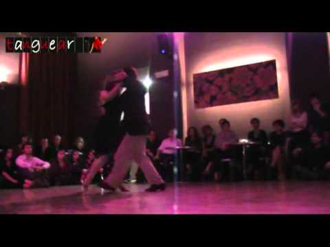  Fernando Sanchez  and  Ariadna Naveira  are  dancing  to  the  milonga  "  Meta Fierro  "