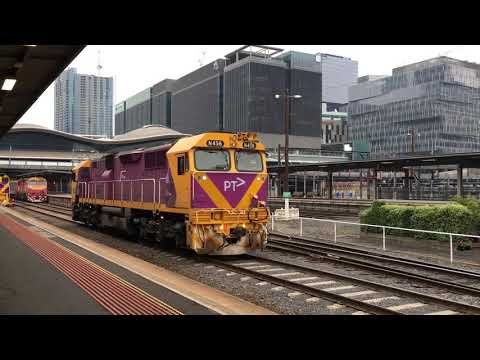 trains at the North Melbourne Flyover and Southern Cross