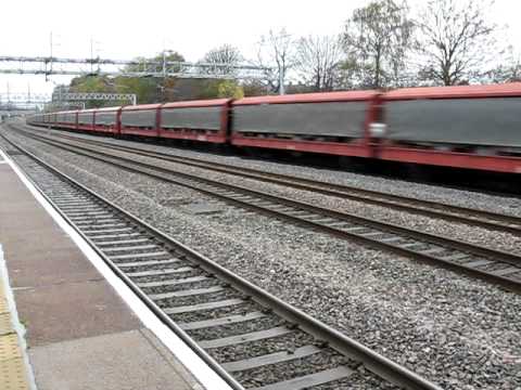 EWS locomotive 66 106 on STVA car wagons on WCML at Tamworth station