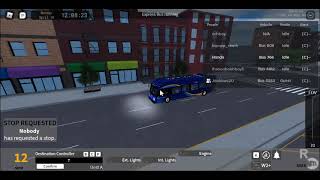 (Legacy) (R) Subway Shuttle MTA NYC Bus • 2017 XN40 #766 B8 Bus passing Bath Ave & 17 Ave