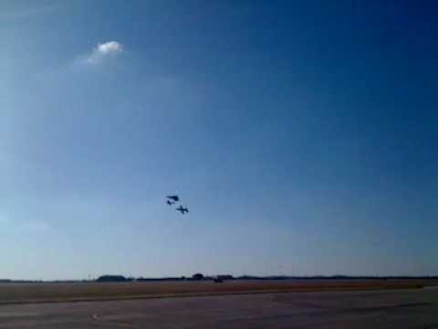 F-22, P-51, A-10 flying in formation