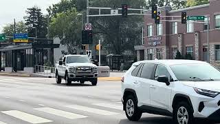 Madison Metro Transit pickup truck departs University Bay BRT Station heading west to Junction Rd.
