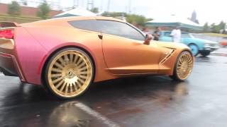 Flip Flop Jaguar on 26s Gold Forgiato and Matching Vette on gold Forgis