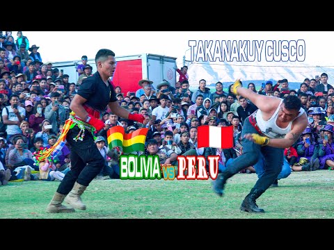 Spectacular fighting fight Peru vs. Peru. tinkus of Bolivia of great titans in Cusco 10/09/2