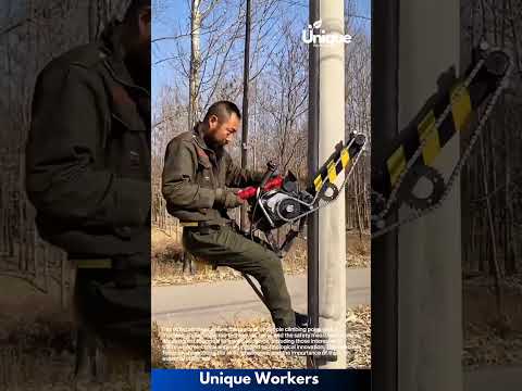 High-Risk Utility Work: Man Repairs Electric Pole Using Specialized Climbing Machine