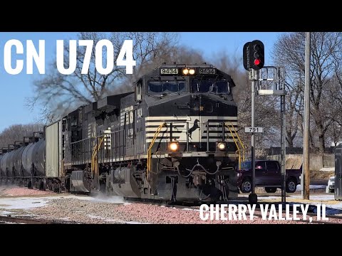 CN U704 with NS old logo D9 leader in Cherry Valley, IL, 2022-02-19