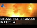 Massive Fire Erupts in Commercial Building in East LA | NBCLA