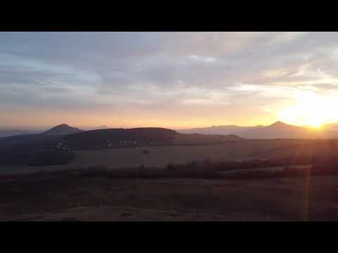 Ladat - Flying at rays of sunset