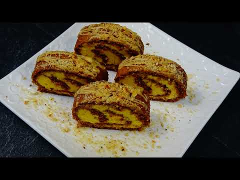 Nussrolle mit feine weiße Schokocreme - Rezept von Naida