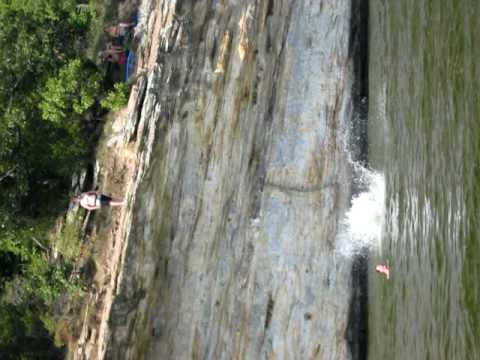 Maribeth jumping off Kinkaid cliffs