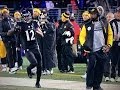 Steelers coach Mike Tomlin stops Jacoby Jones.