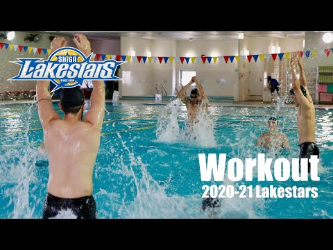 モダン-スイミングプール-非対称形状-日光浴-木材