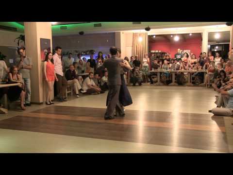  Jorge Tsaousoglou  and  Ioanna Andrikopoulou  are  dancing  to  the  vals  "  Pobre Flor  "  by  Alfredo De Angelis  at  Sunny Tango Festival  in  2012