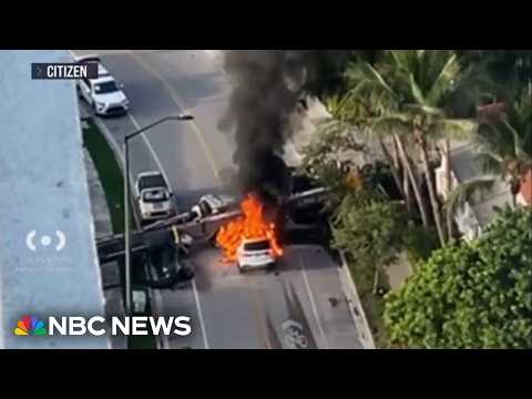 Crane collapses onto cars in Miami