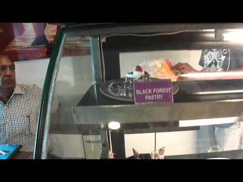 Inside & outside Richi Rich cake shop, 4 Swaraj Ashram Shopping Centre, Opposite Millenium Mall, Station Road, Bardoli, Gujarat, India; 21st April 2012