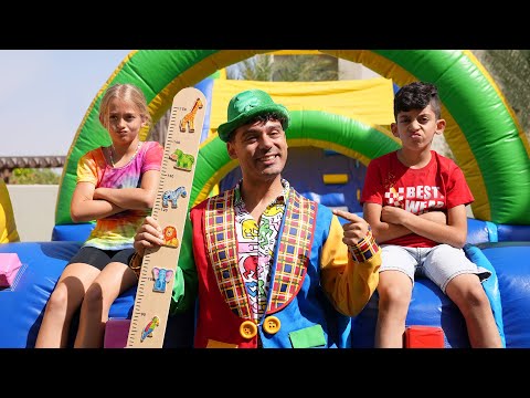 Jason play with good friend on slides and toys for fun