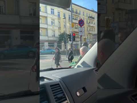 Man Riding a bicycle with a Glass full of BEER on his head stops at traffic to drink. #Shorts #Funny