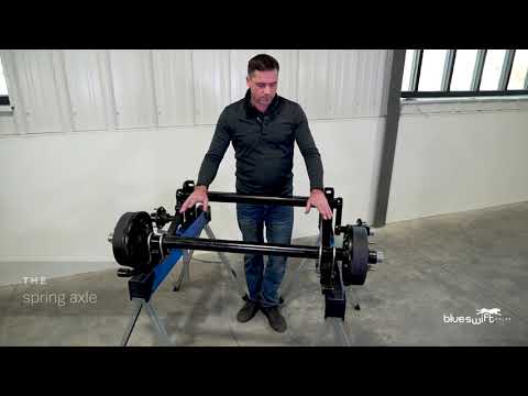 Learn Axle Components, Differences between torsion axles and spring axles on your trailer.