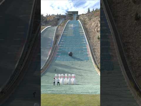 The worlds LARGEST BOWLING BALL down an Olympic Ski Jump!